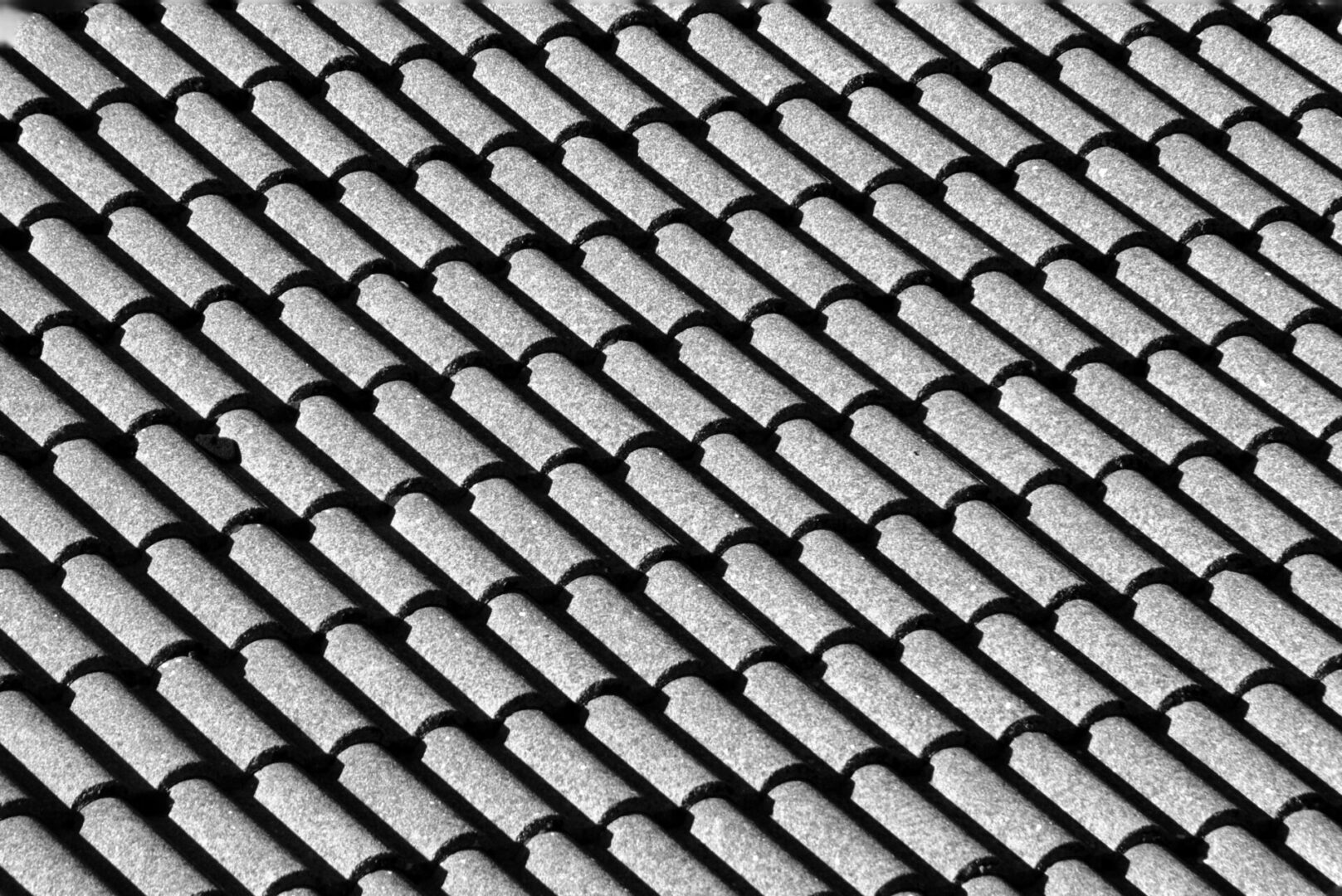 A close up of the roof tiles on a building.